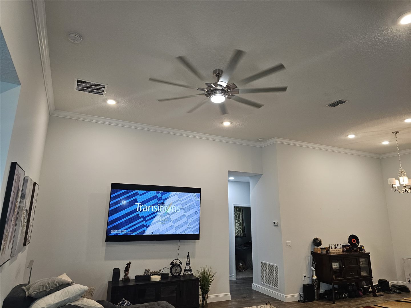 Ceiling fan and recessed lighting in a living room